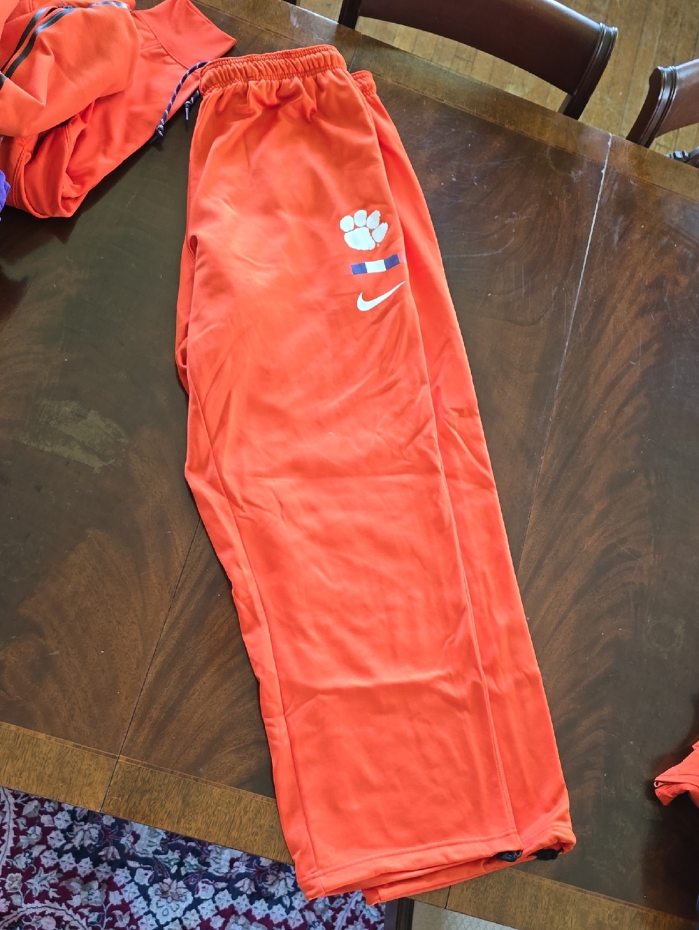 Nike Dri Fit Clemson Orange Sweatpants with White Swoosh and Paw Logo